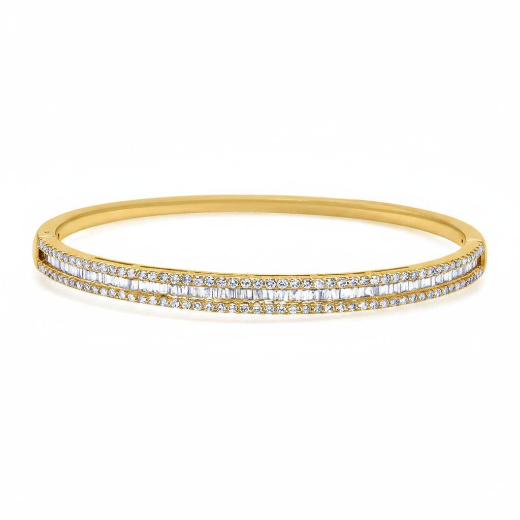 18k gold bangle bracelet with baguette and round brilliant diamonds by Diamond Tales