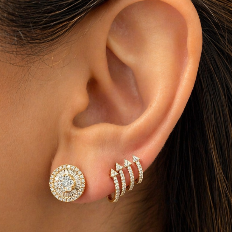 18k yellow gold stud earrings with circular cluster of baguette and round diamonds