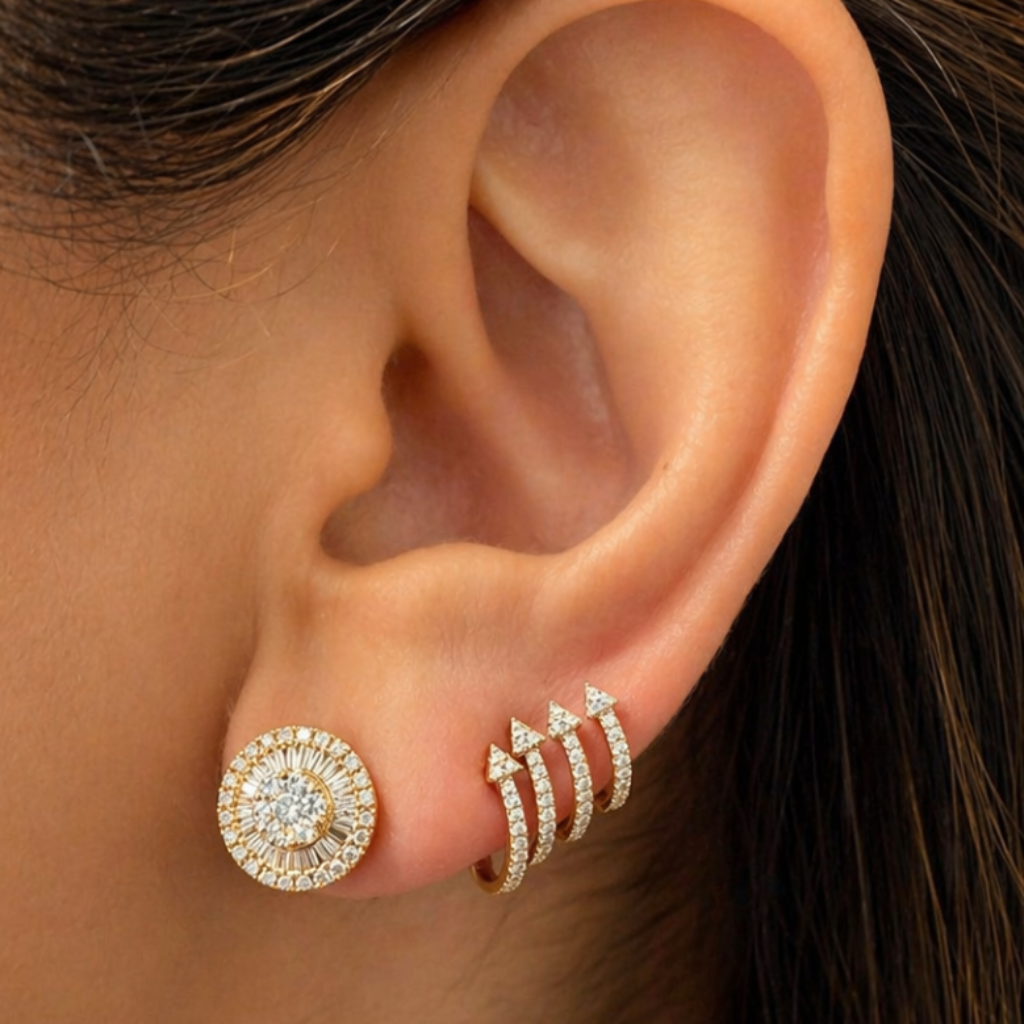 18k yellow gold stud earrings with circular cluster of baguette and round diamonds