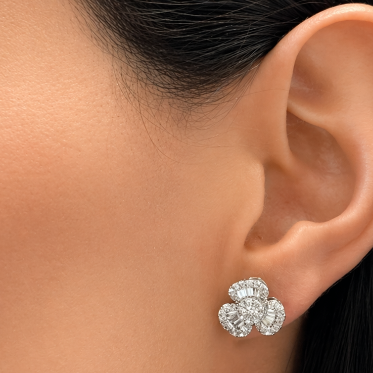 18k gold baguette and round diamond flower earrings by Diamond Tales