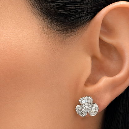 18k gold baguette and round diamond flower earrings by Diamond Tales
