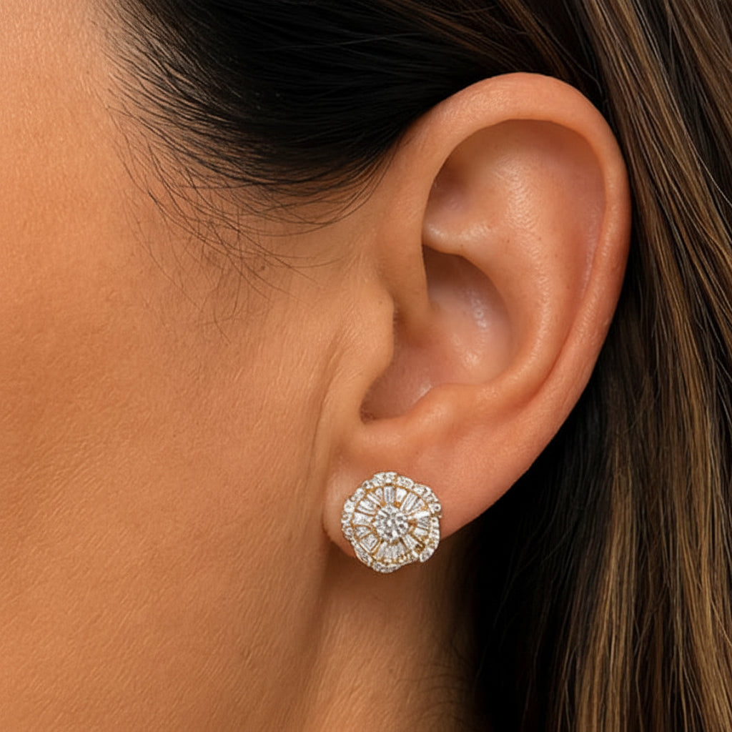 18k yellow gold flower-motif earrings set with baguette and round brilliant diamonds totaling 1.35 cts