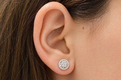 18k gold stud earrings with baguette and round brilliant-cut diamonds totaling 0.46 carats
