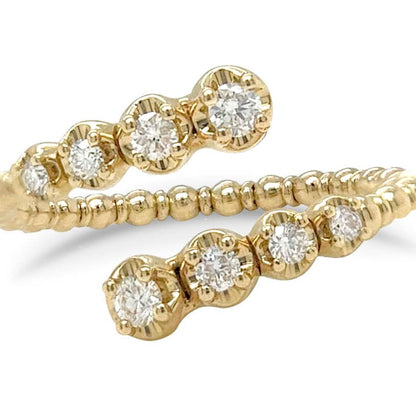 18k gold open band ring with beaded texture and inset diamond accents