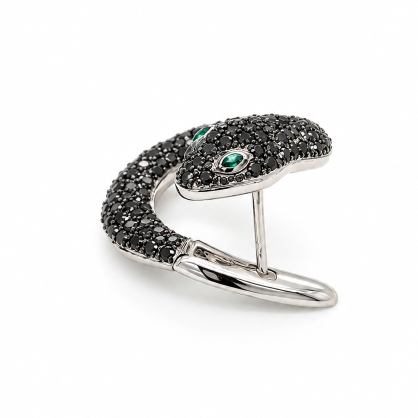 Black diamond and emerald snake earring in 18k white gold, detail view