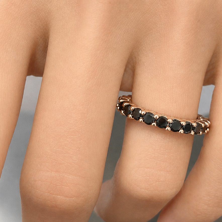 18k rose gold eternity ring with black diamonds by Diamond Tales