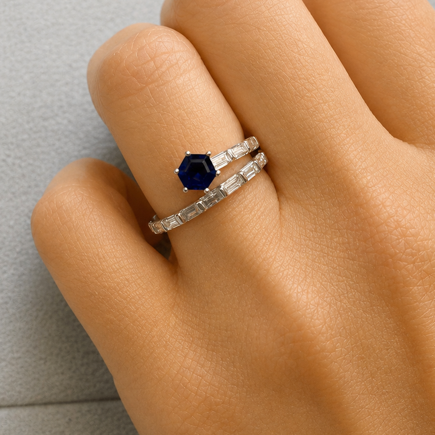 Platinum ring with blue sapphires and baguette diamonds by Diamond Tales