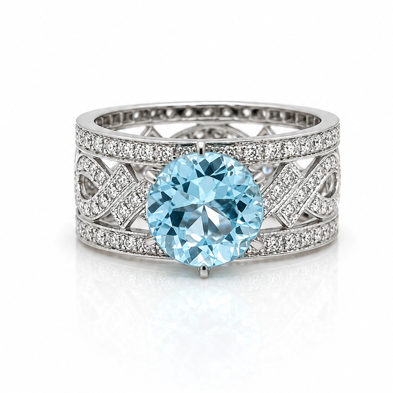 18k gold ring with round blue topaz and diamonds