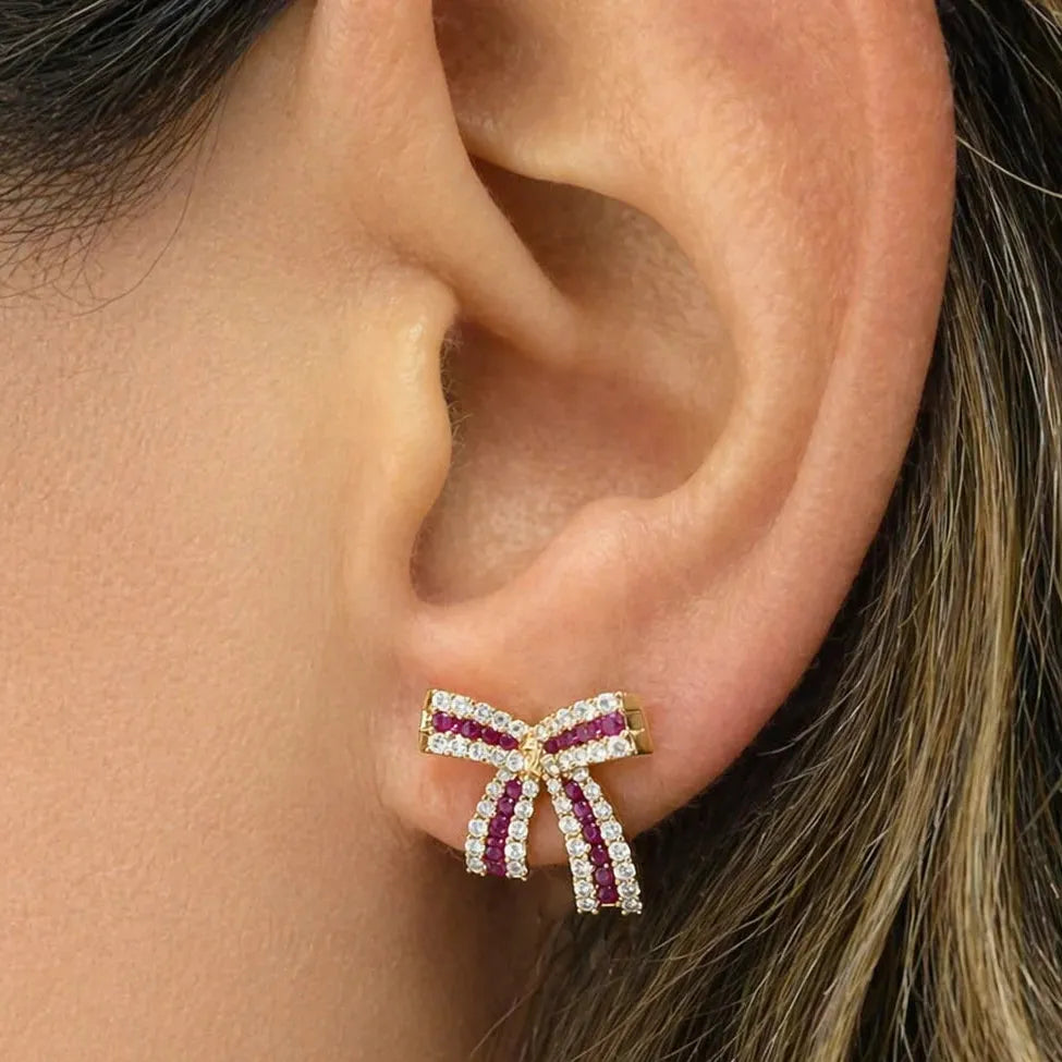 18k gold bow stud earrings with ruby and diamond accents