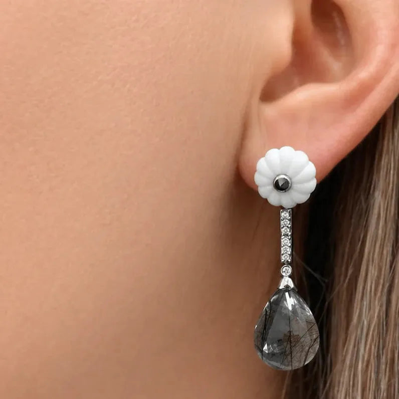 18k white gold drop earrings with carved white onyx, rutilated quartz, and diamond accents