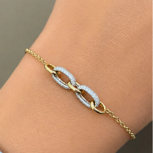 18k yellow gold bracelet with interlocking links and 132 diamonds totaling 0.63 carats