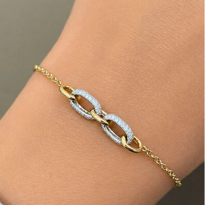 18k yellow gold bracelet with interlocking links and 132 diamonds totaling 0.63 carats