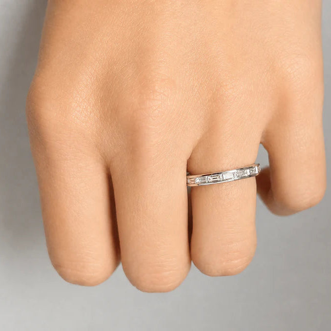 18k gold channel-set band with baguette diamonds flush in linear alignment