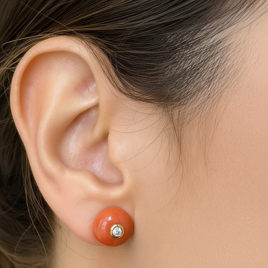 18k gold coral and diamond stud earrings by Diamond Tales