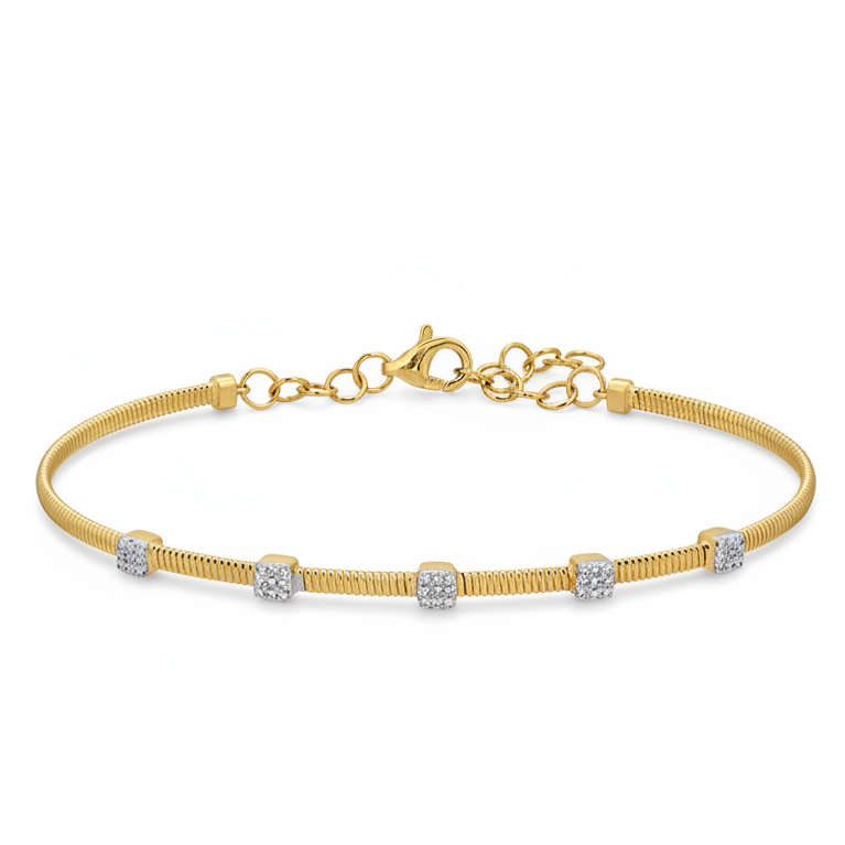 diamond bangle bracelet in 14k yellow gold with diamond accents