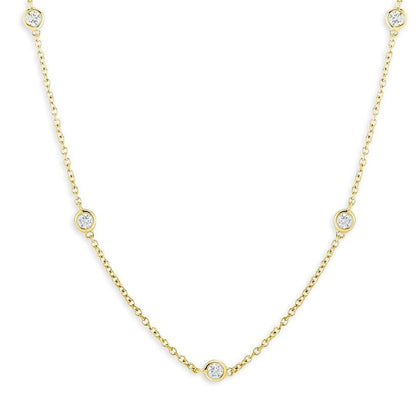 18k yellow gold Diamond by the Yard necklace with bezel-set diamond stations on a fine chain