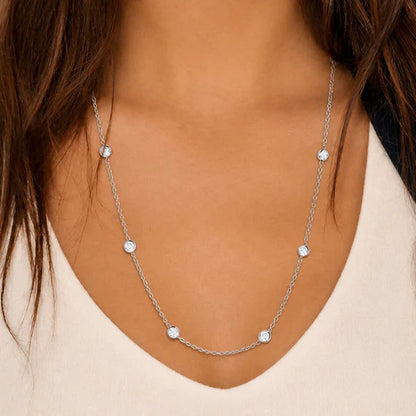 18k white gold Diamond by the Yard necklace with 17 bezel‑set diamonds on a 21.5‑inch chain