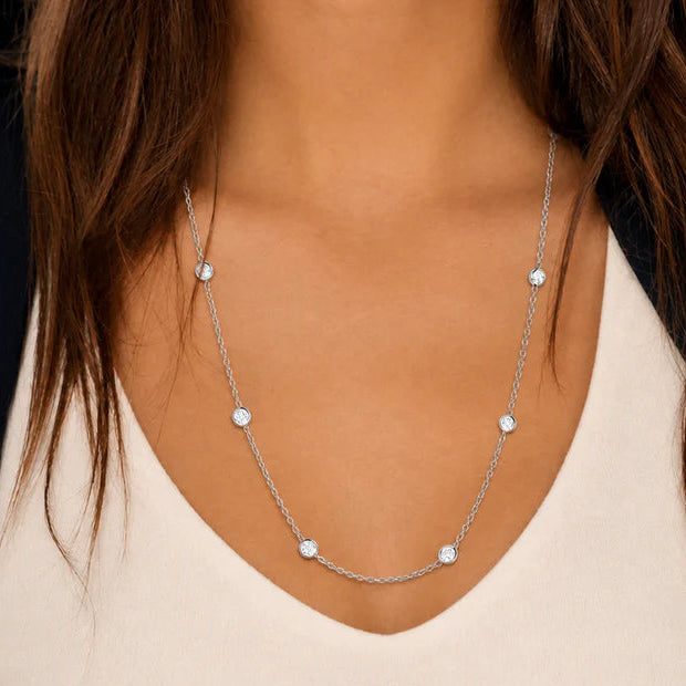 18k gold diamond-by-the-yard necklace with spaced bezel-set diamonds