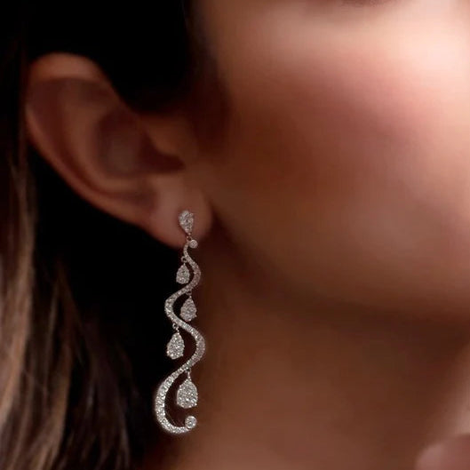 18k gold chandelier earrings with cascading diamond layers