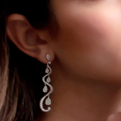 18k gold chandelier earrings with cascading diamond layers