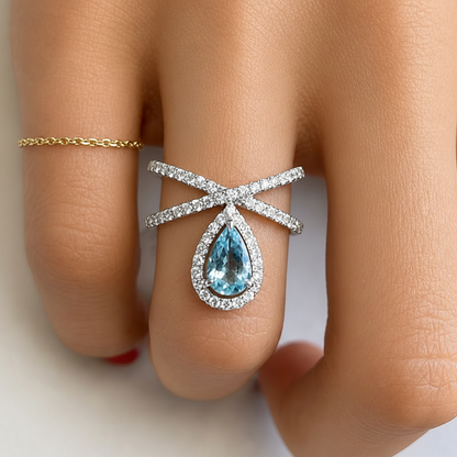 18k white gold criss-cross ring with round brilliant diamonds by Diamond Tales