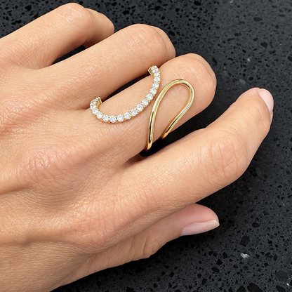 14k yellow gold double curved diamond ring worn on hand