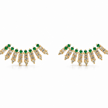 Diamond and emerald ear crawler earrings in 14k yellow gold, front view