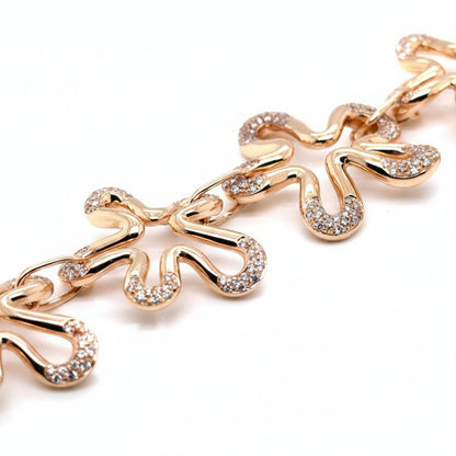 diamond flower bracelet in 18k rose gold with floral motifs
