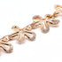 diamond flower bracelet in 18k rose gold with floral motifs