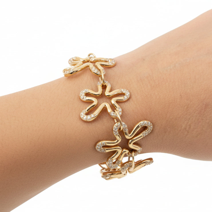 diamond flower bracelet in 18k rose gold with floral motifs
