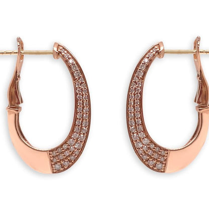 14k gold hoop earrings with diamonds along the front side