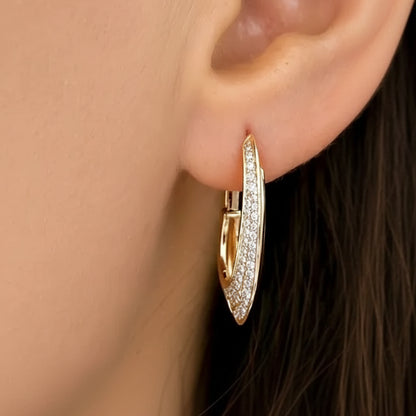 14k gold hoop earrings with diamonds along the front side
