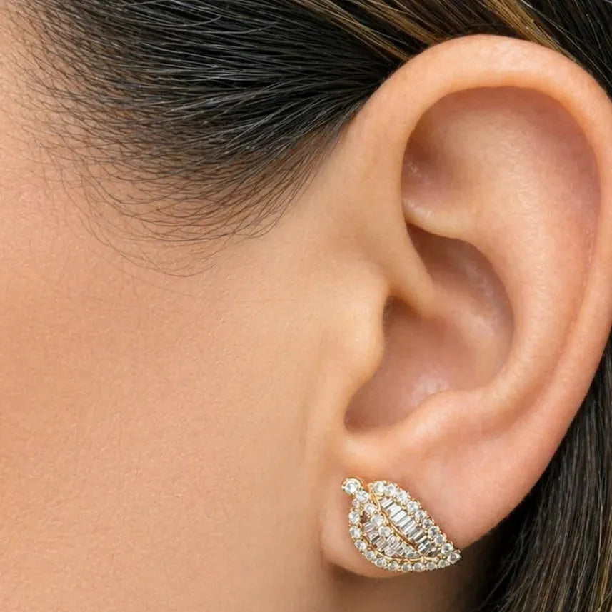 14k gold leaf-shaped stud earrings with diamond accents