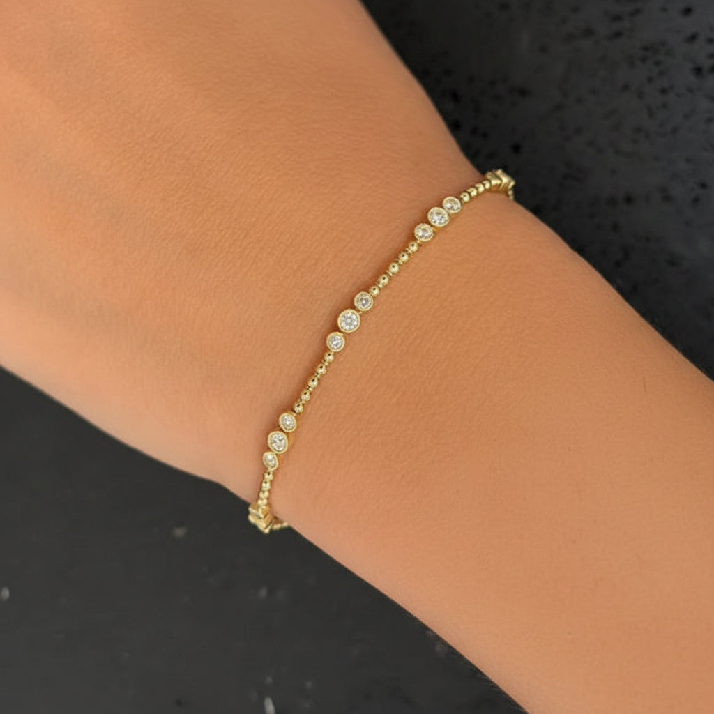 diamond open bangle bracelet in 14k yellow gold with diamond accents