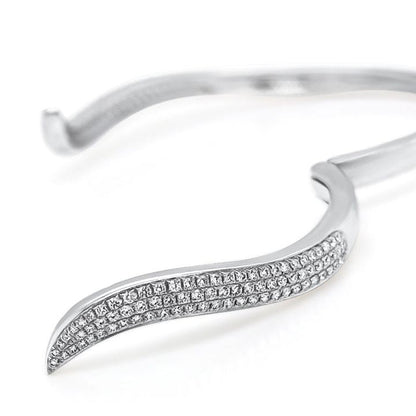 18k white gold open bangle bracelet with round brilliant diamonds by Diamond Tales