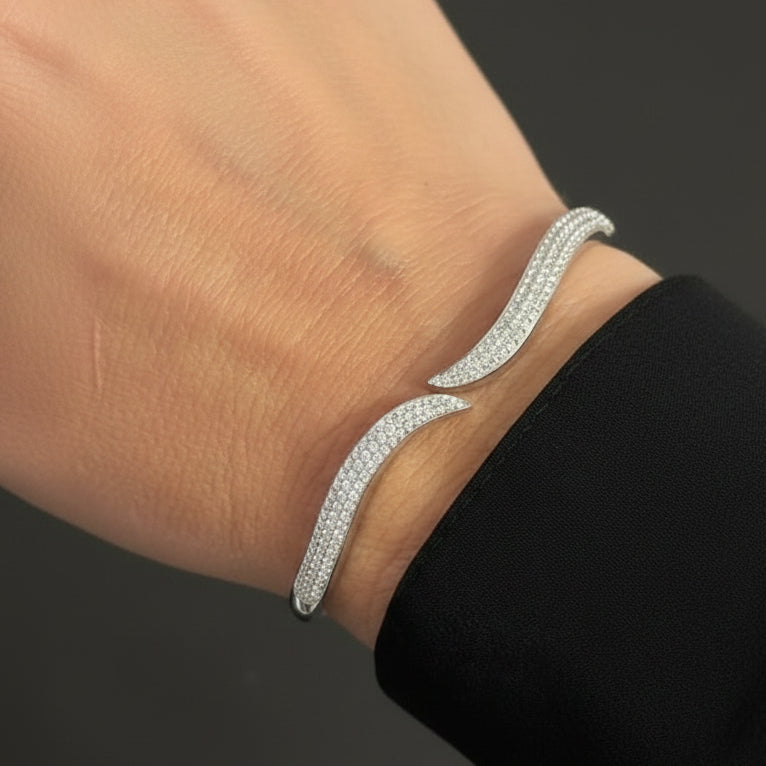 18k white gold open bangle bracelet with round brilliant diamonds by Diamond Tales