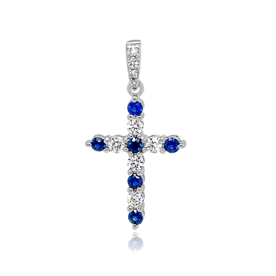 18k gold cross pendant with round brilliant diamonds and blue sapphires by Diamond Tales