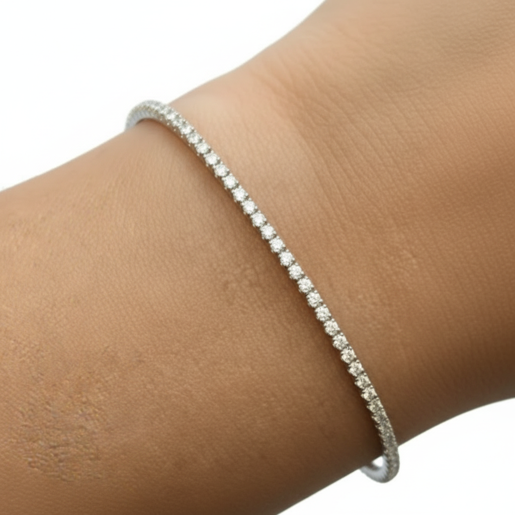 14k white gold tennis bangle bracelet with 0.55 carats of round brilliant-cut diamonds