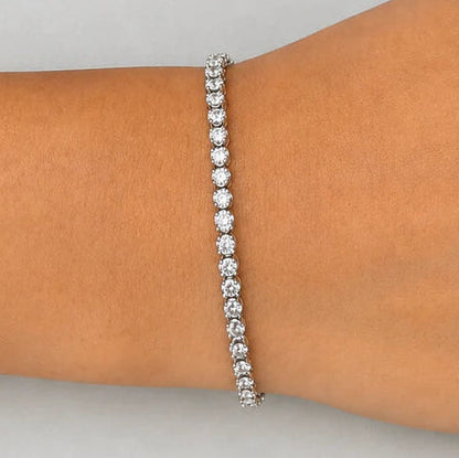18k white gold tennis bracelet with 57 round brilliant diamonds by Diamond Tales