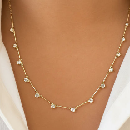 diamond triangle station necklace in 14k gold with geometric triangle motifs