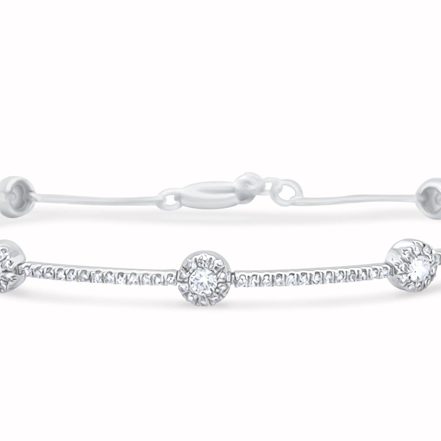 18k white gold bracelet with gold dots and round brilliant diamonds by Diamond Tales