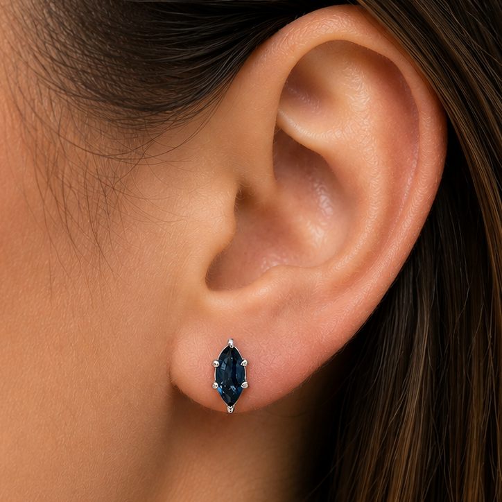 Macro detail of the marquise sapphire and protected point setting