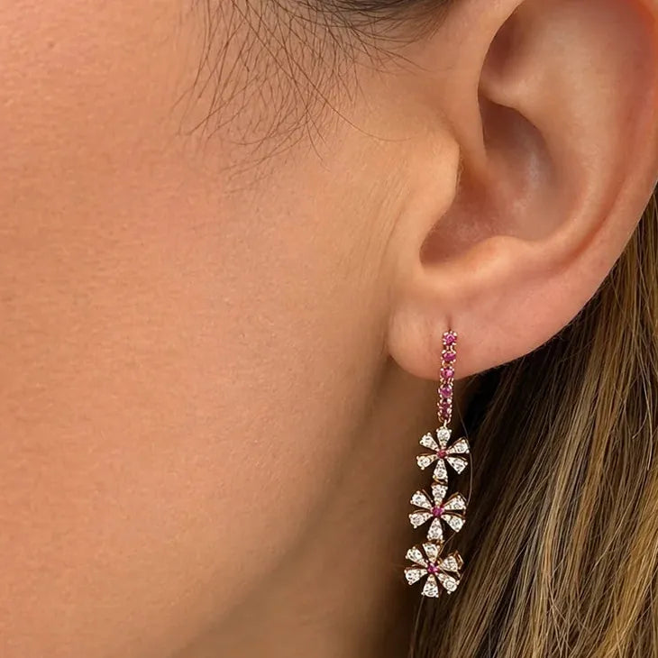 18k rose gold flower drop earrings with pavé diamonds and central rubies