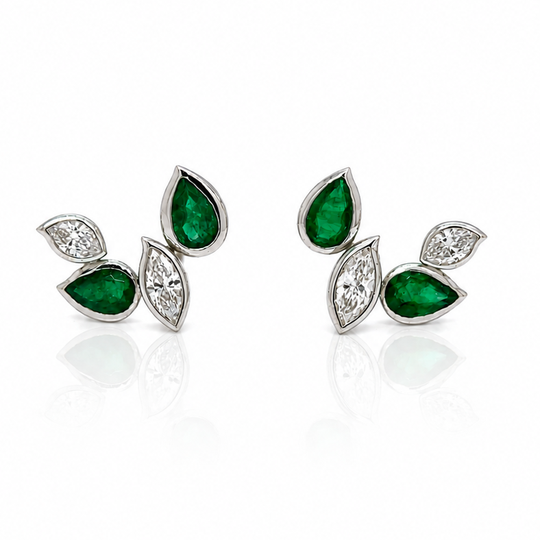 18k white gold earrings with marquise-cut emeralds and marquise diamonds