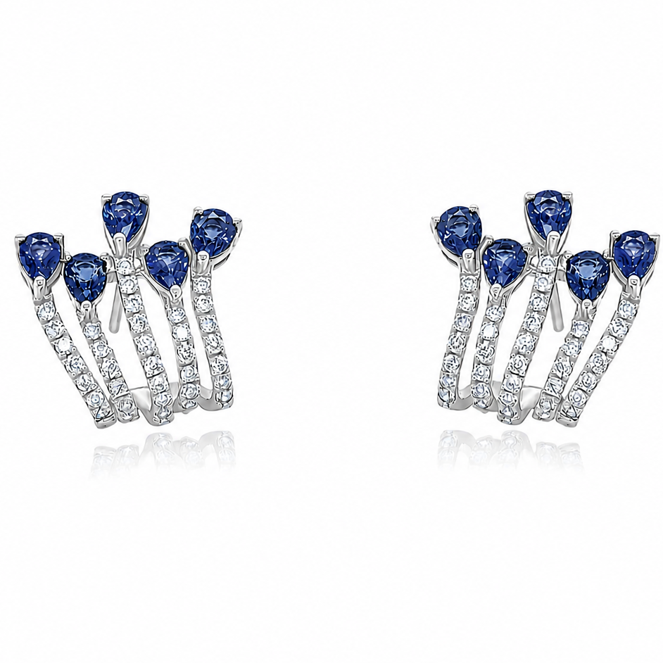 18k white gold lobe studs with five pear blue sapphires and diamonds per ear