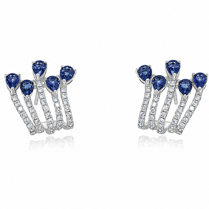 18k white gold lobe studs with five pear blue sapphires and diamonds per ear