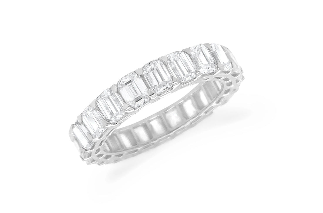 18k white gold eternity ring with emerald-cut diamond settings