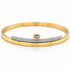 18k two-tone gold bangle bracelet with a central emerald-cut diamond and pave diamonds