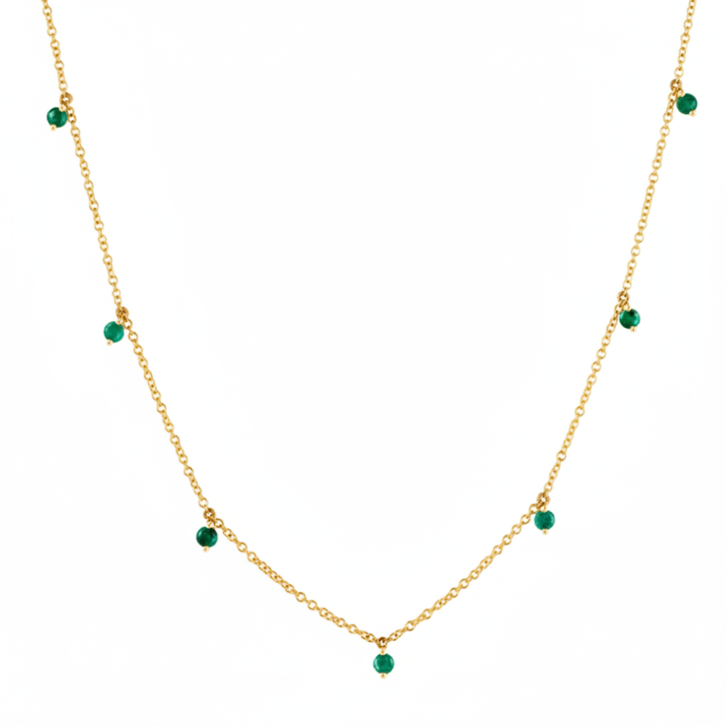 emerald shaker pendant necklace in 14k gold with moving round emeralds