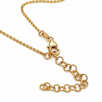 Emerald and diamond tennis necklace shown with adjustable length rings